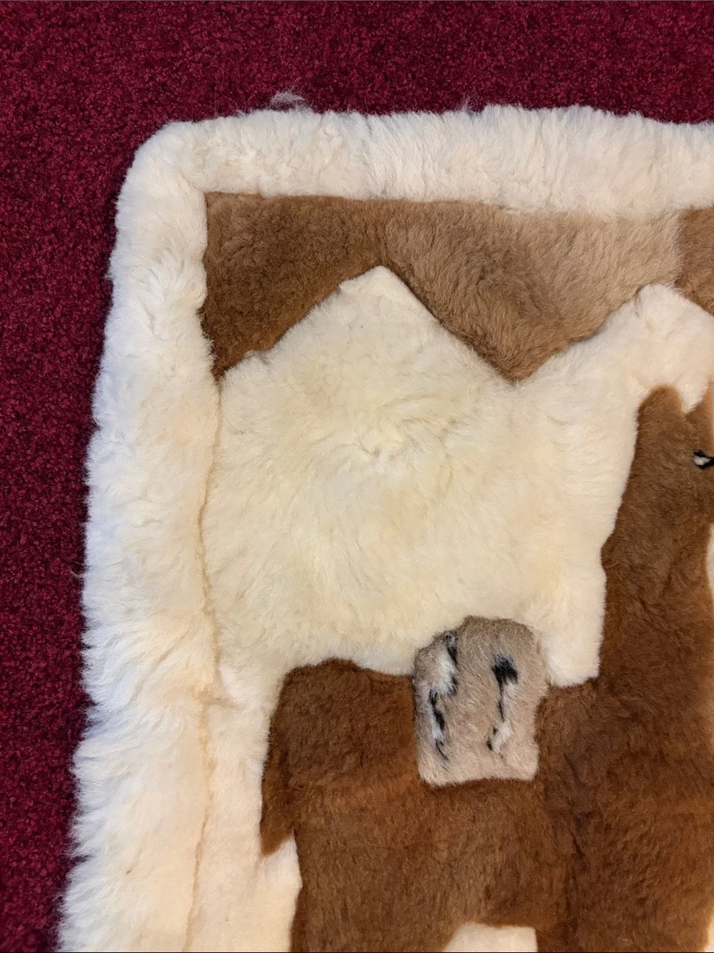 Brown Llama Sheepskin Rug - Cream Border